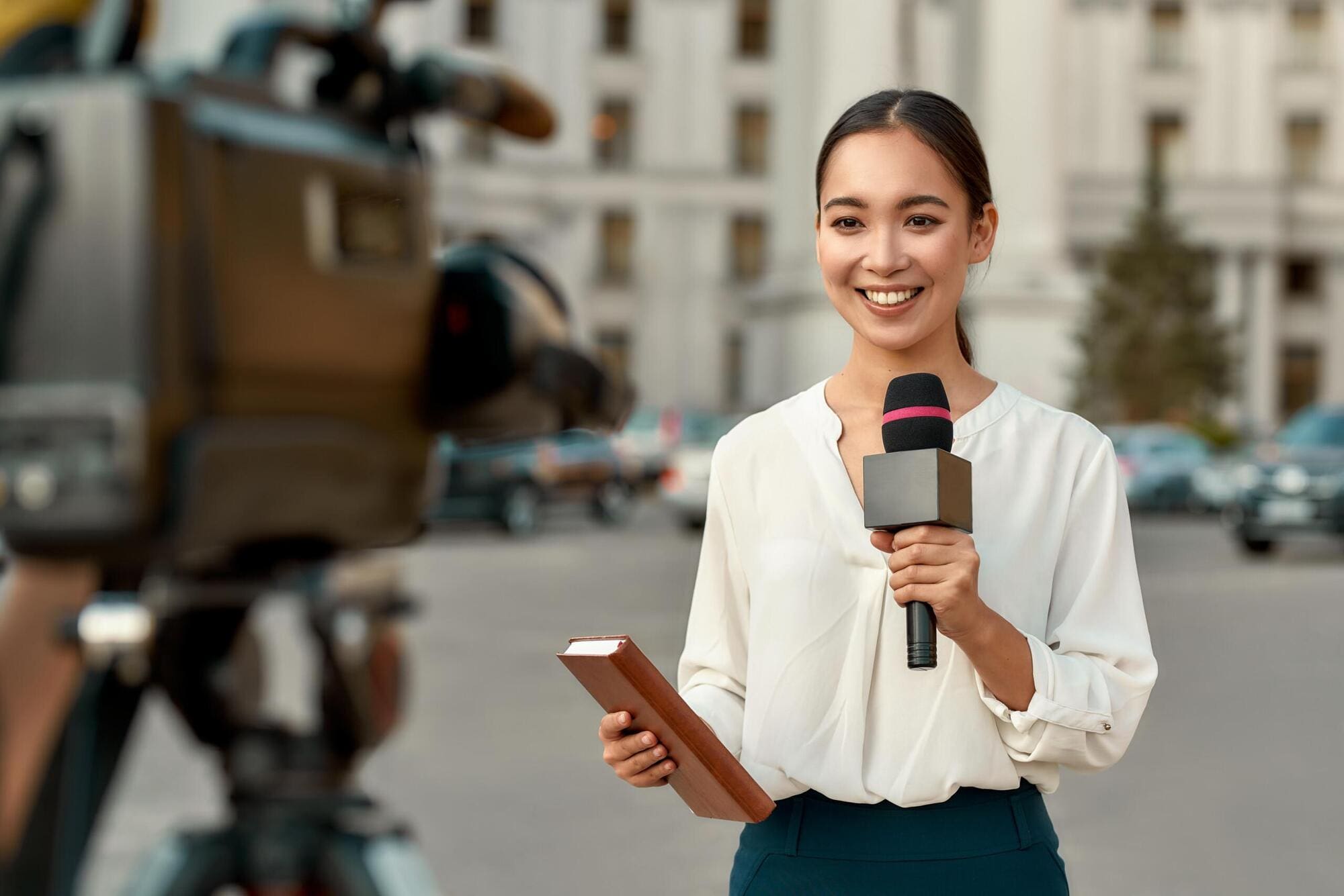 Journalist talking to camera