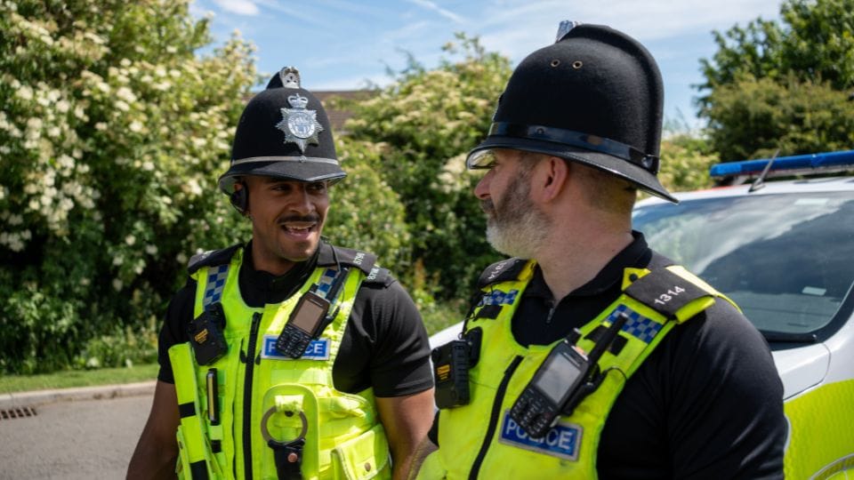 Two police officers having a conversation
